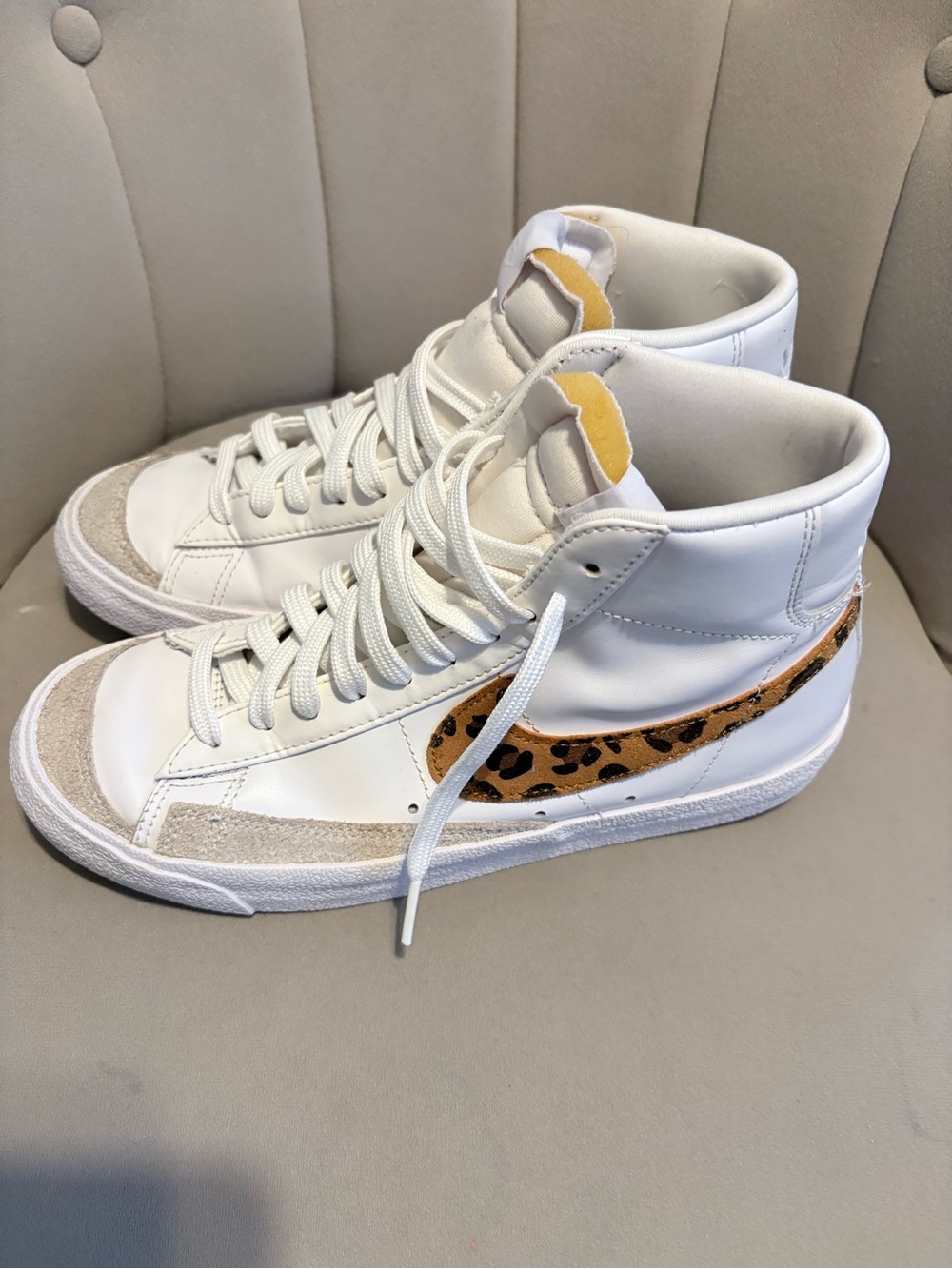 Nike White High-Top Sneakers with Leopard Swoosh